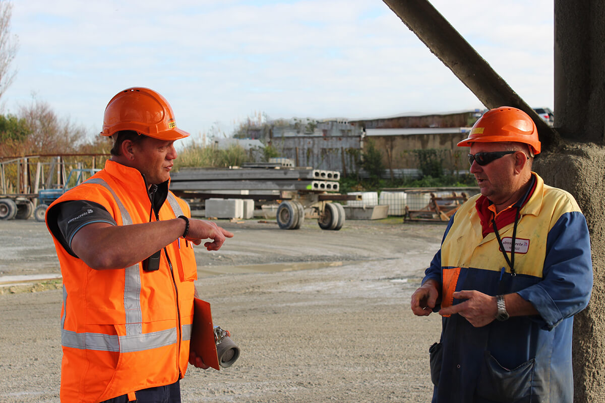 Precast construction workers in the yard